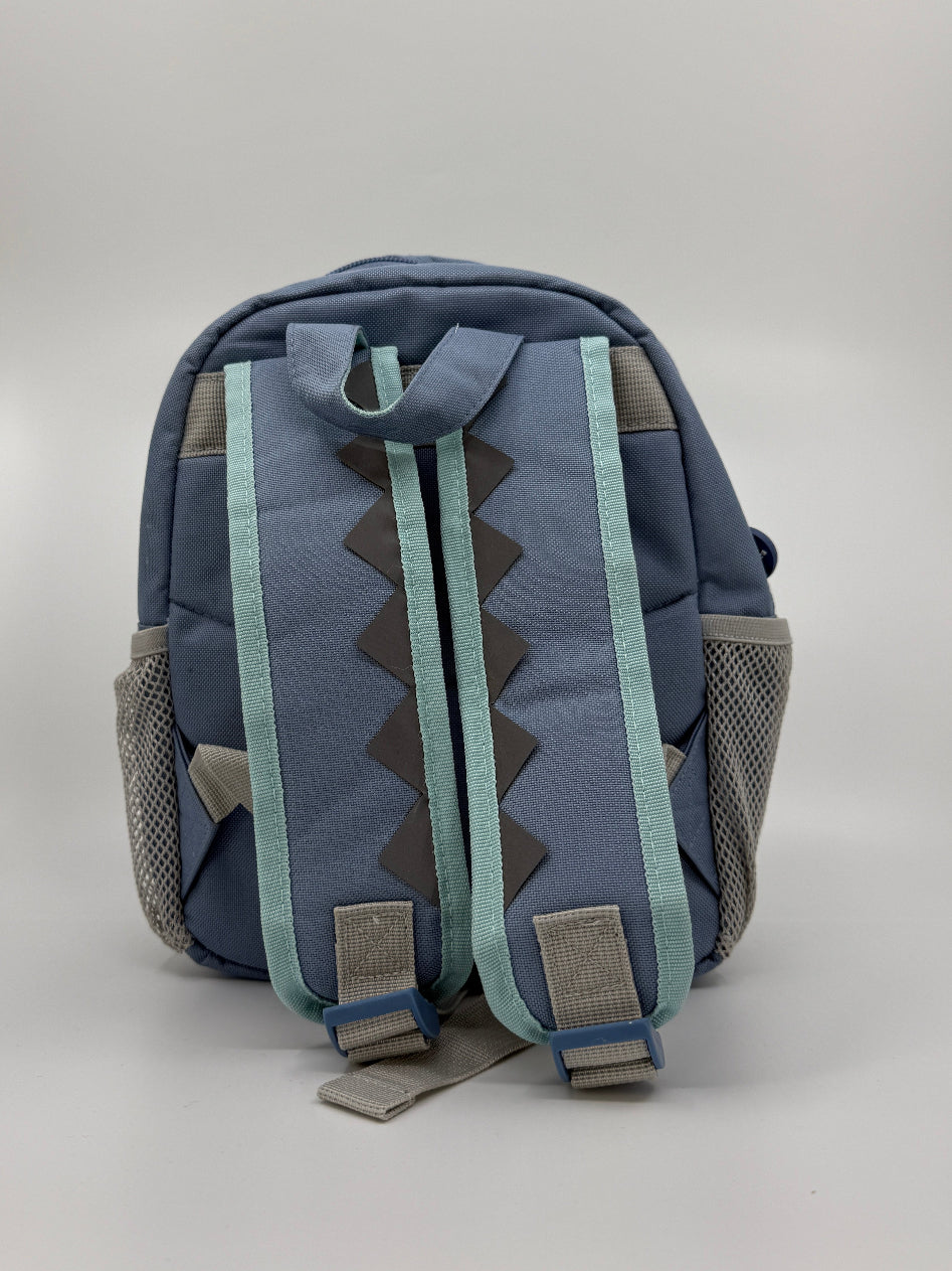 Sinine laste seljakott dinosaurusega