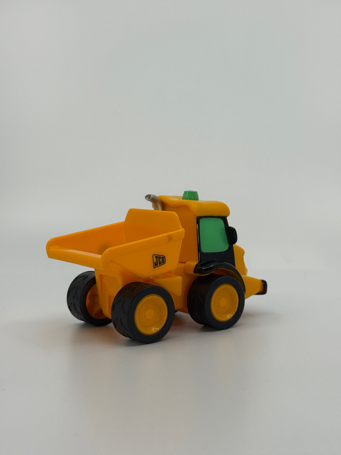 Kollane mängukallur näoga