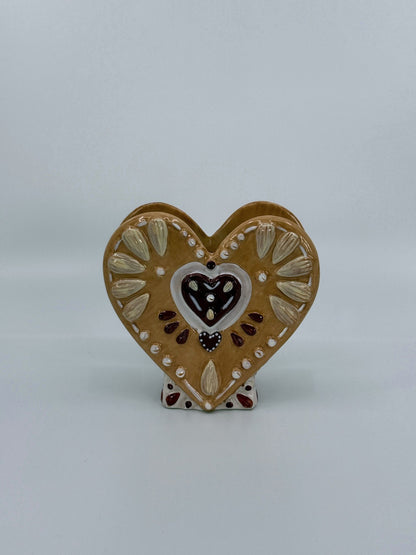 Südamekujuline teeküünla alus