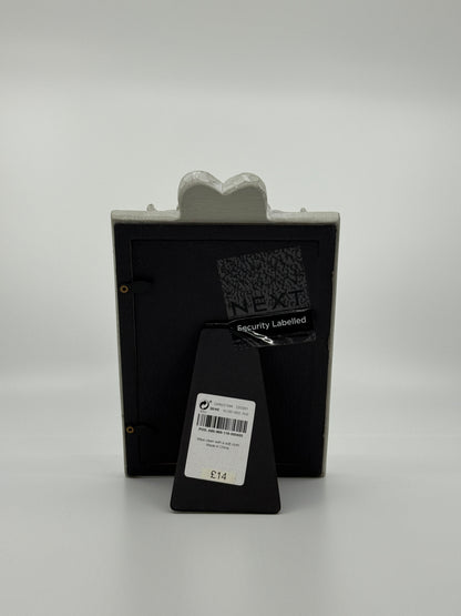 Hallikas fotoraam südame detailiga