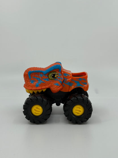 Oranž dinosauruseliku välimusega monsterauto