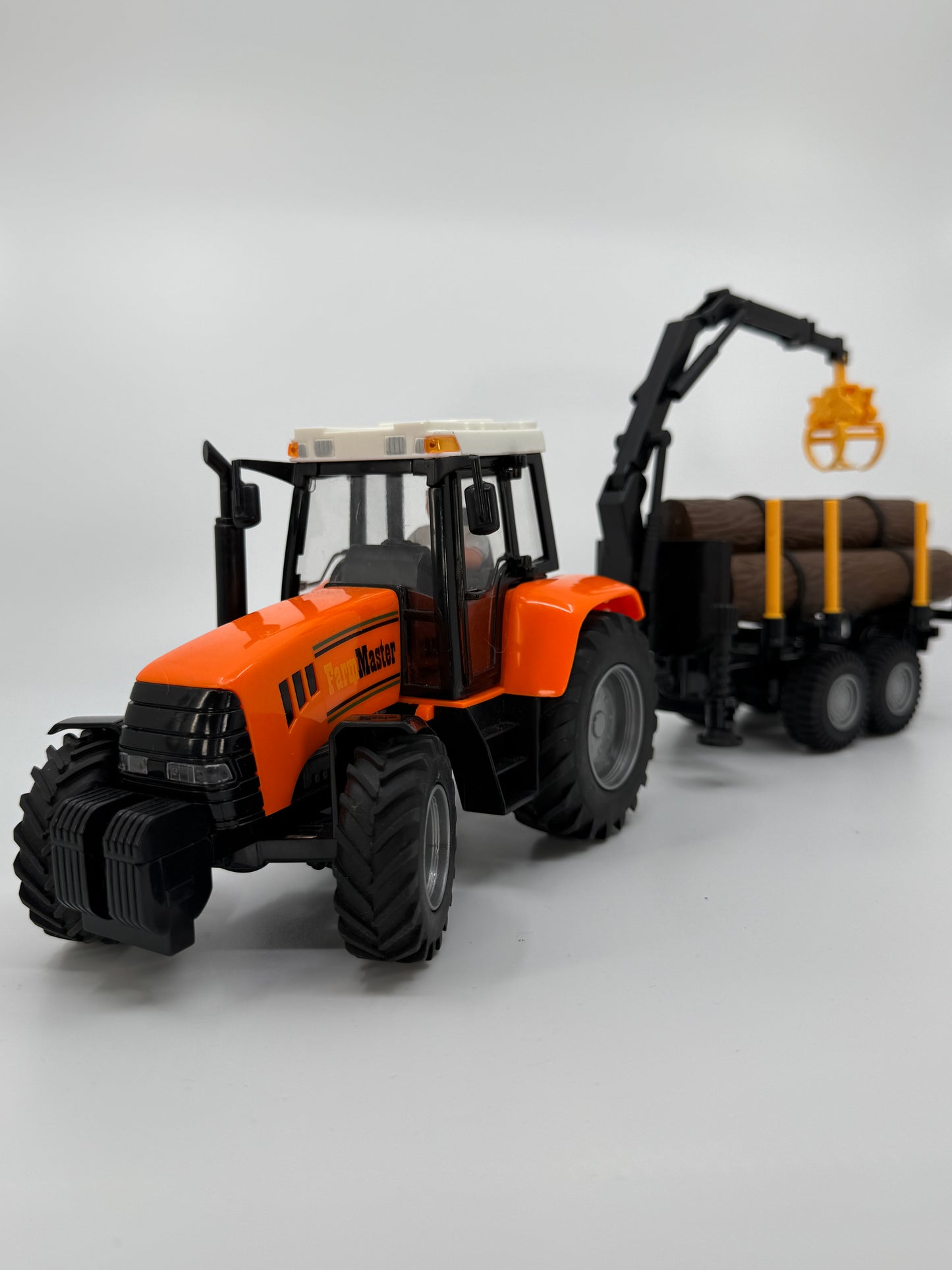 Farm Master mängutraktor haagise ja palkidega