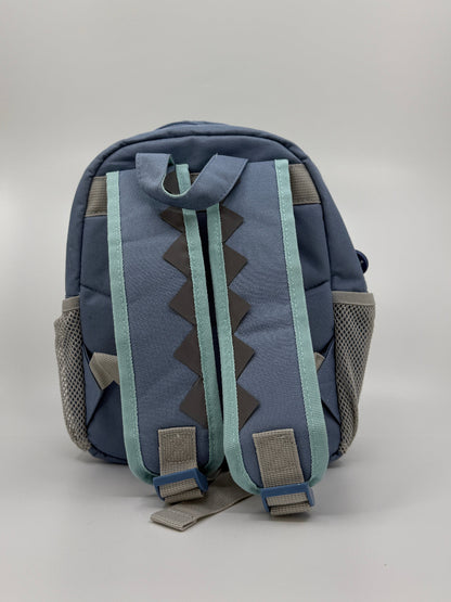 Sinine laste seljakott dinosaurusega