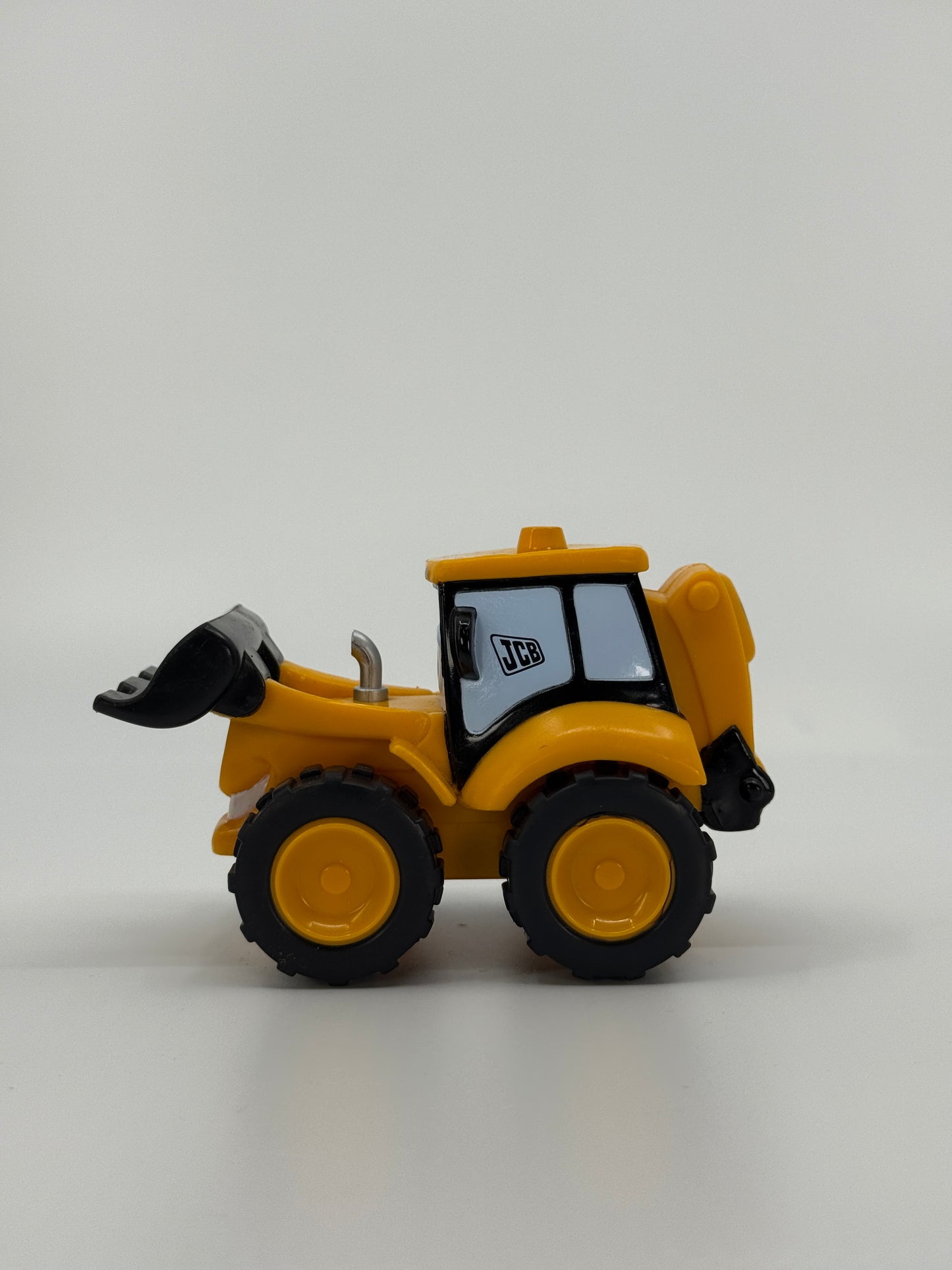 JCB mängutraktor näoga