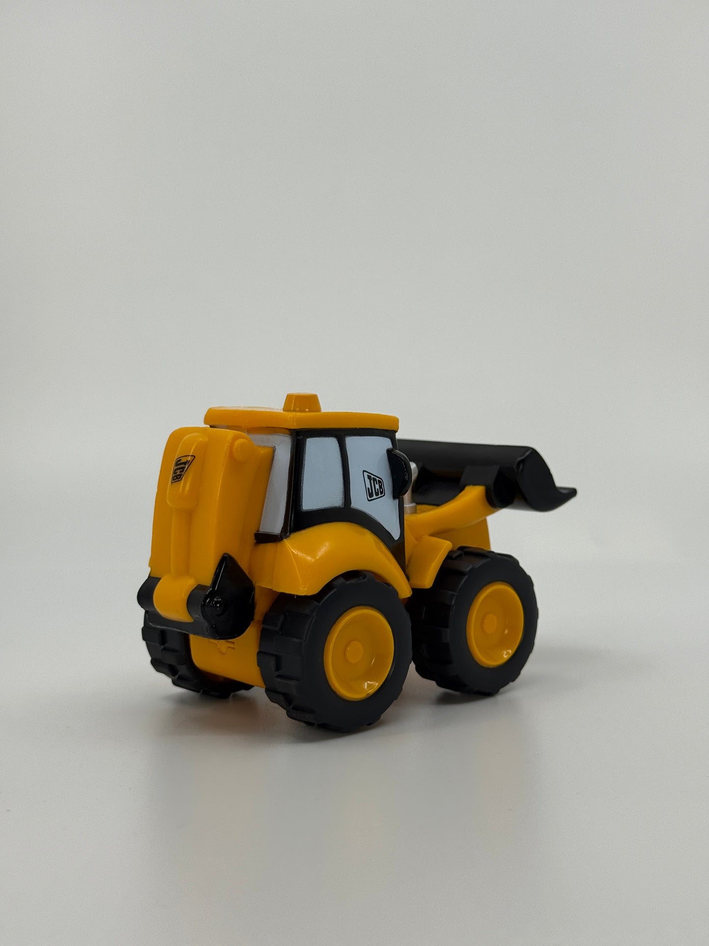 JCB mängutraktor näoga