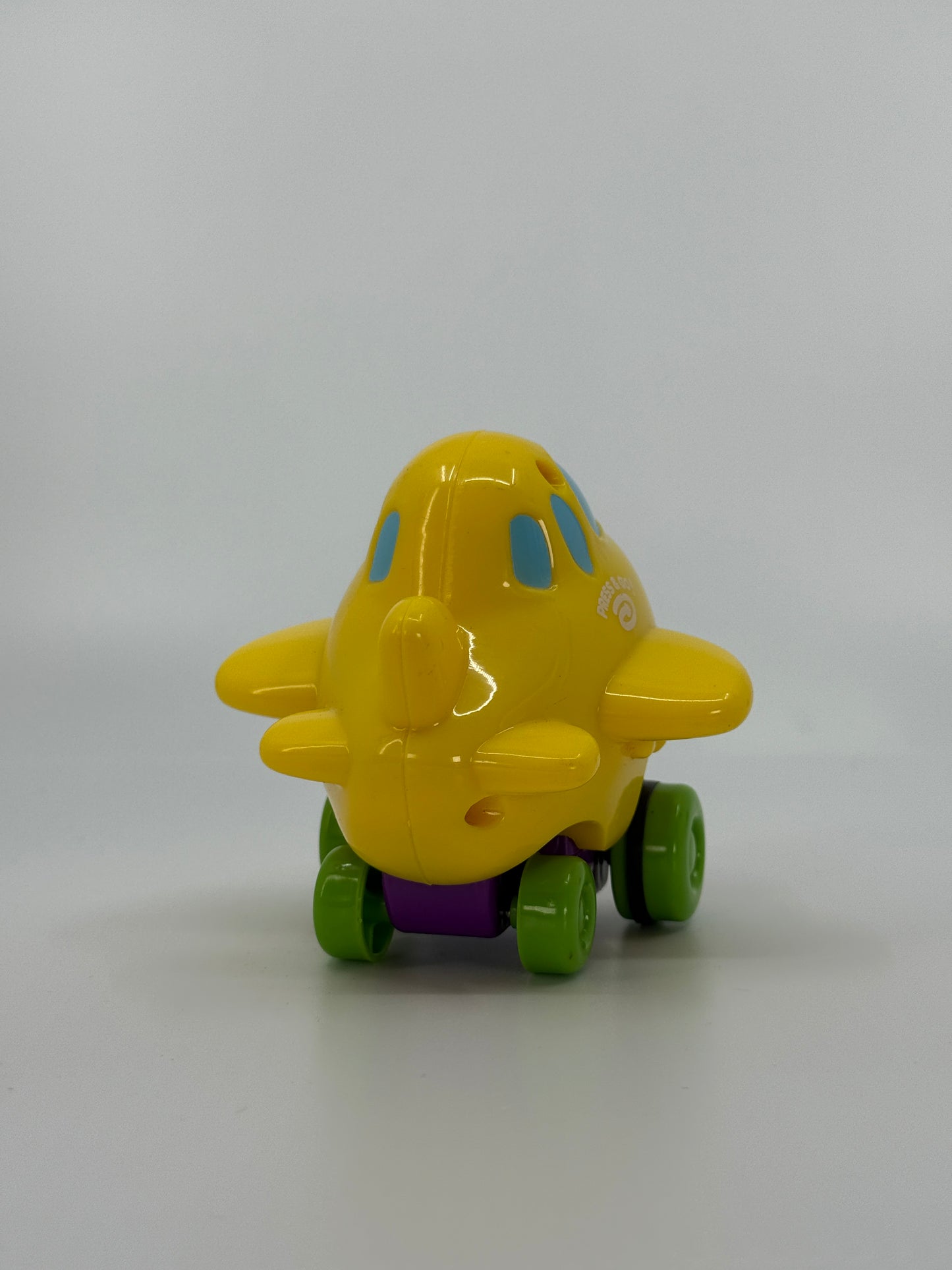 Värviline mängulennuk ratastel