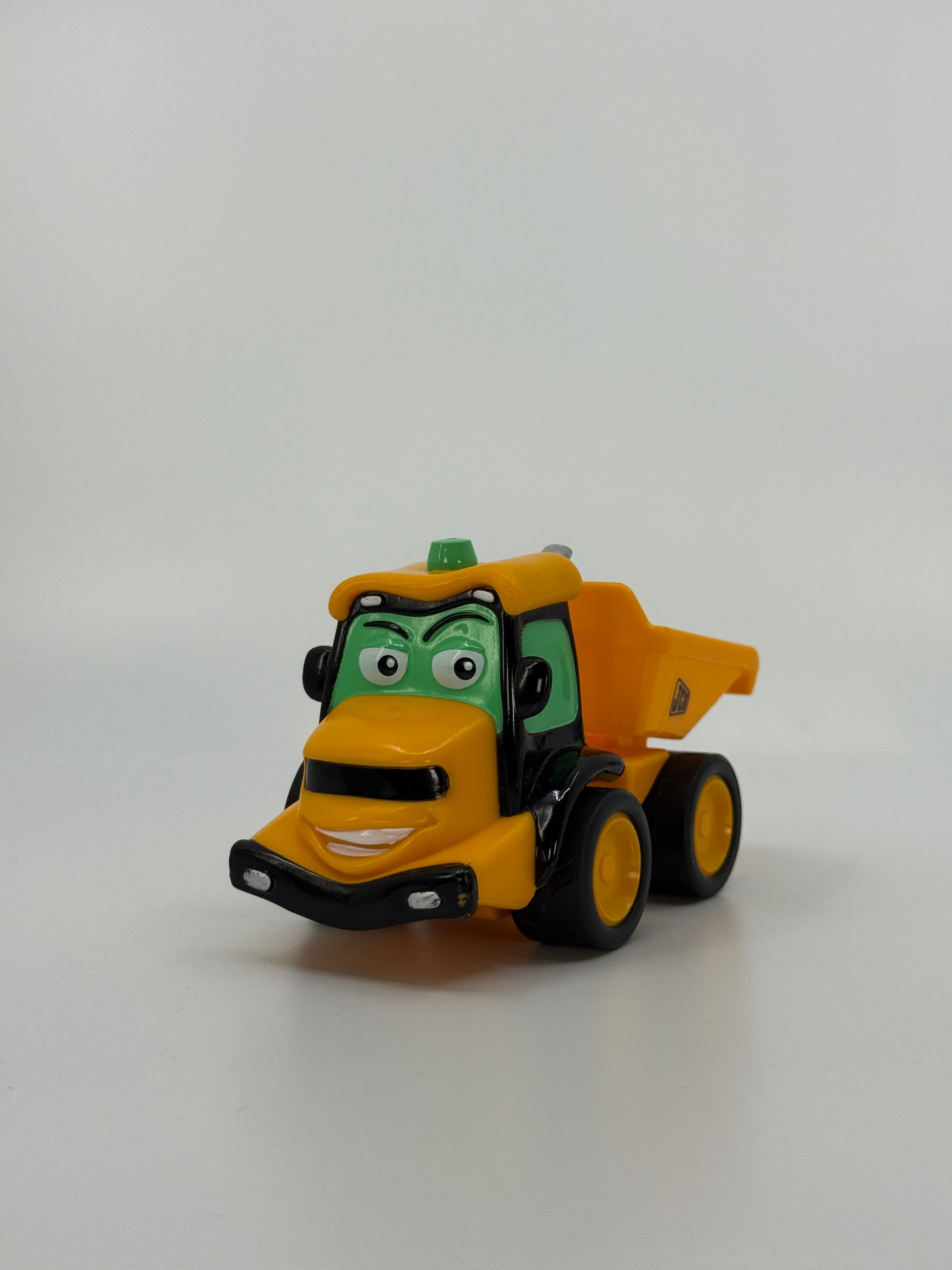 Kollane mängukallur näoga