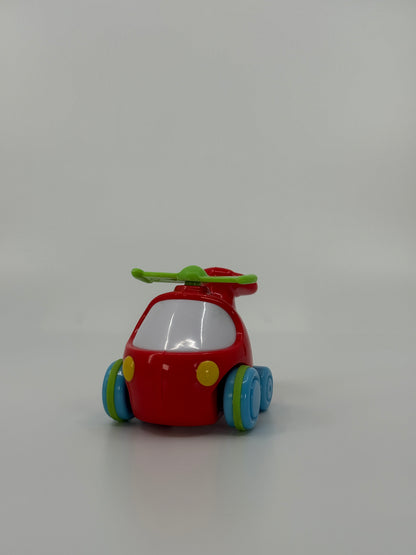 Punane mänguhelikopter ratastel