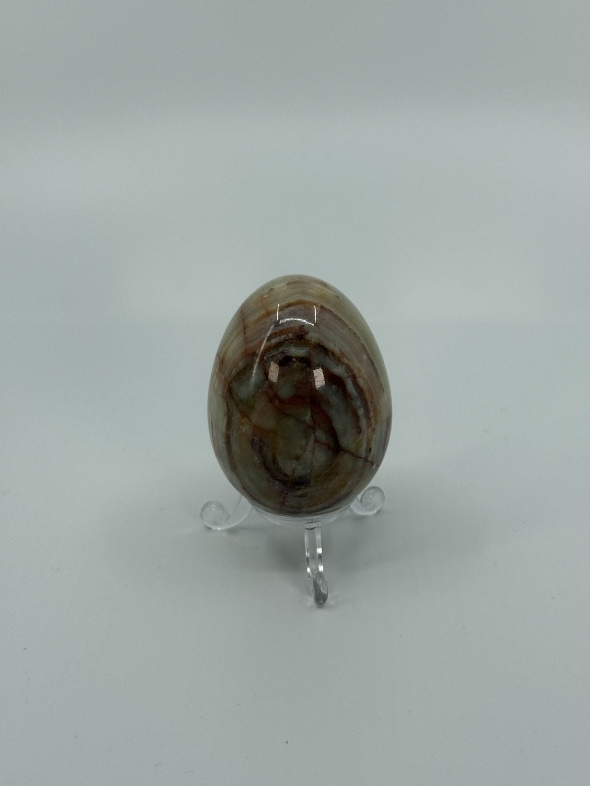 Dekoratiivne onyx-muna alusega