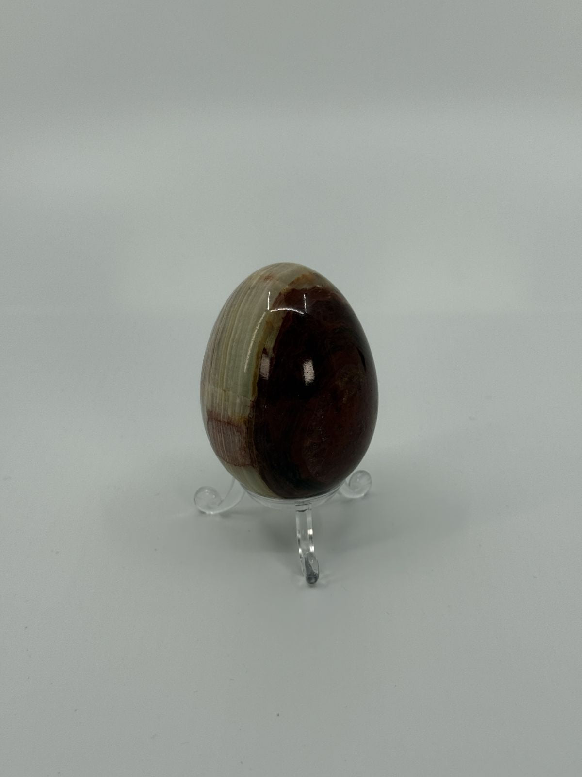 Dekoratiivne onyx-muna alusega