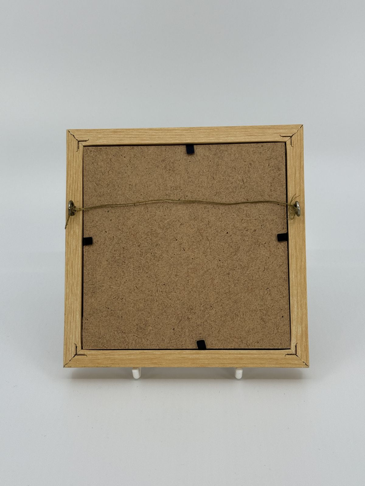 Tikandiga pildiraam mängukaruga