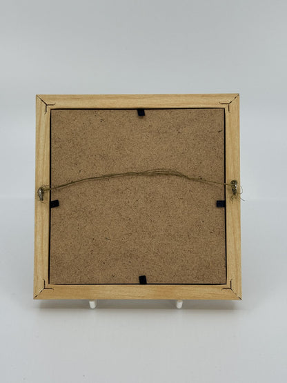 Tikandiga pildiraam mängukarudega