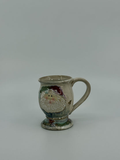 Jõuluteemalised keraamilised kruusid lumememm ja jõuluvana