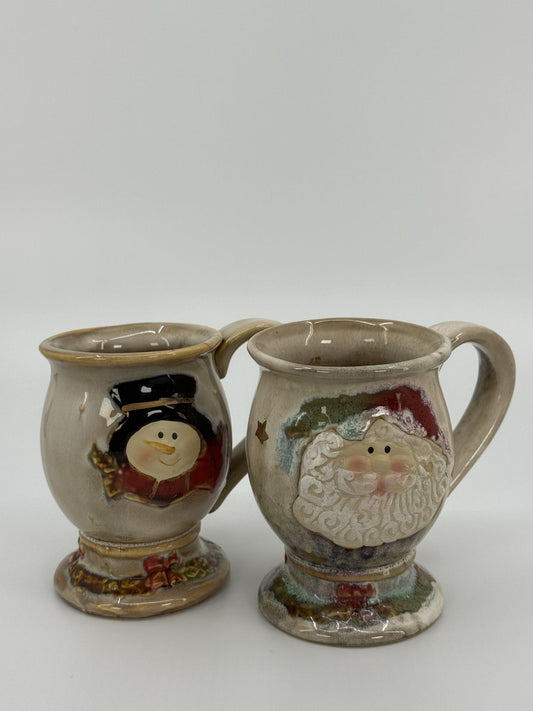 Jõuluteemalised keraamilised kruusid lumememm ja jõuluvana