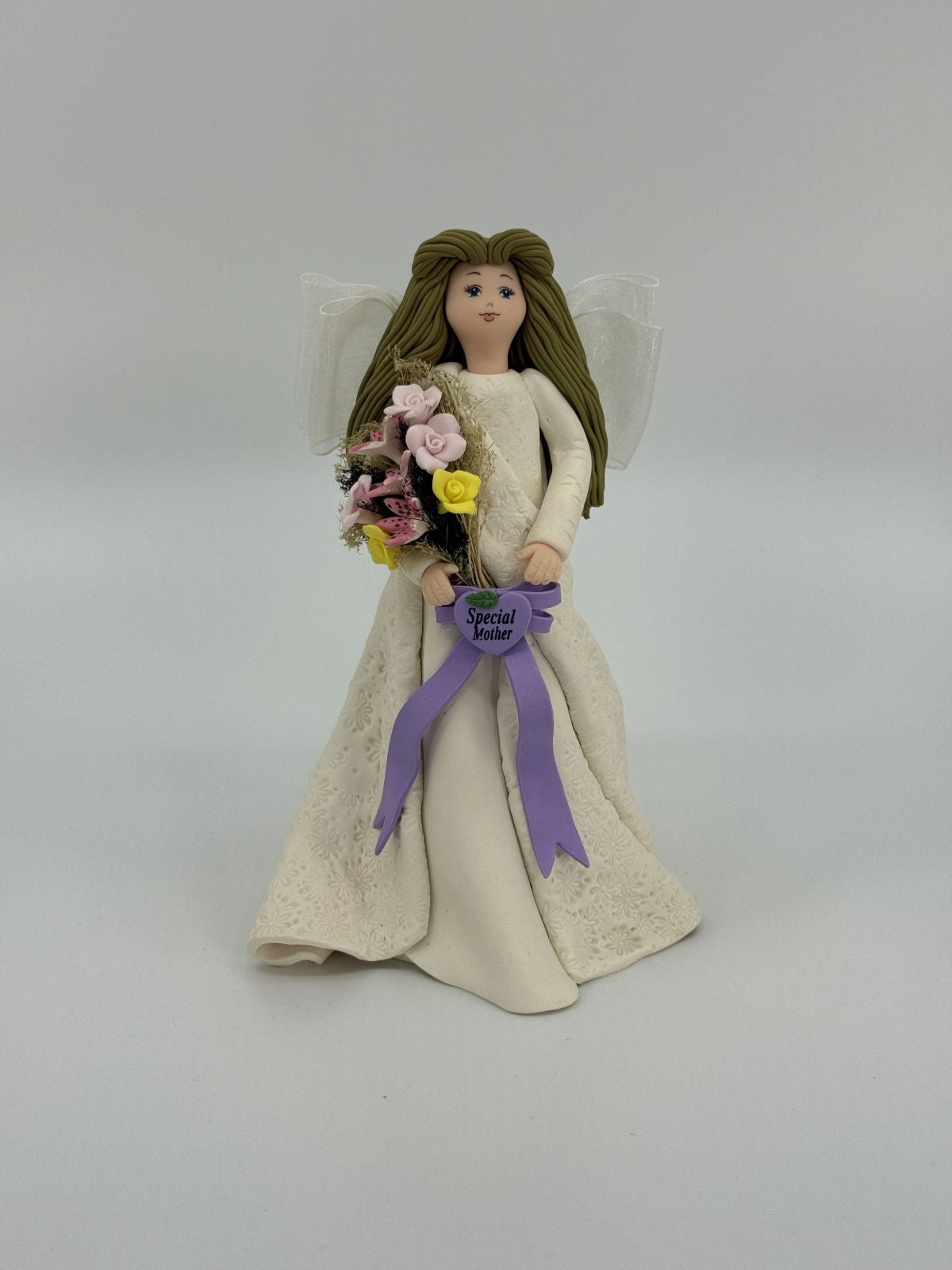 Ema dekoratiivkuju lilledega