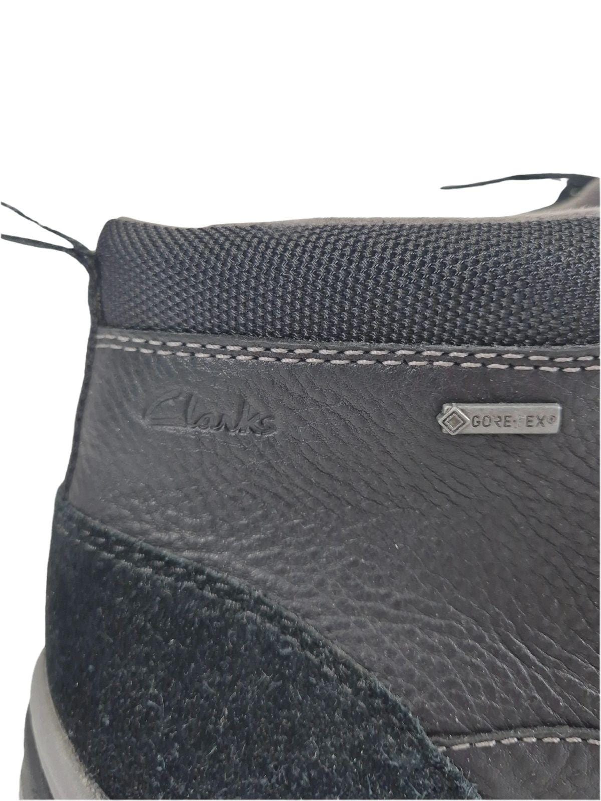 CLARKS Meeste mustad nahast poolsaapad