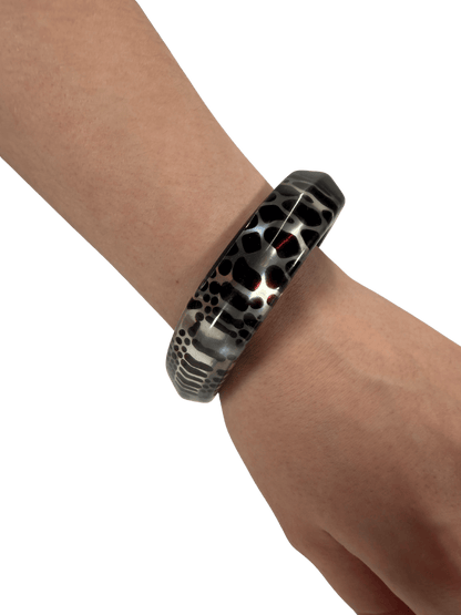 SECOND BEST TAASKASUTUS Must-hõbedane käevõru